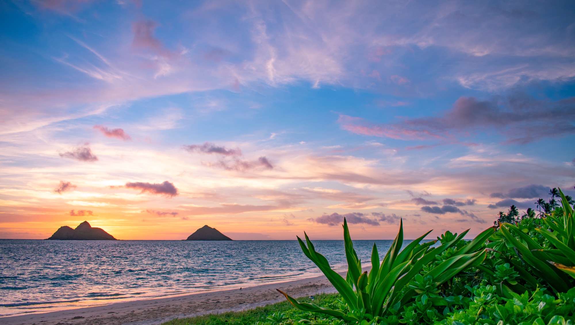 Lanikai Beach and the Mokulua islands at golden hour, windward Oʻahu